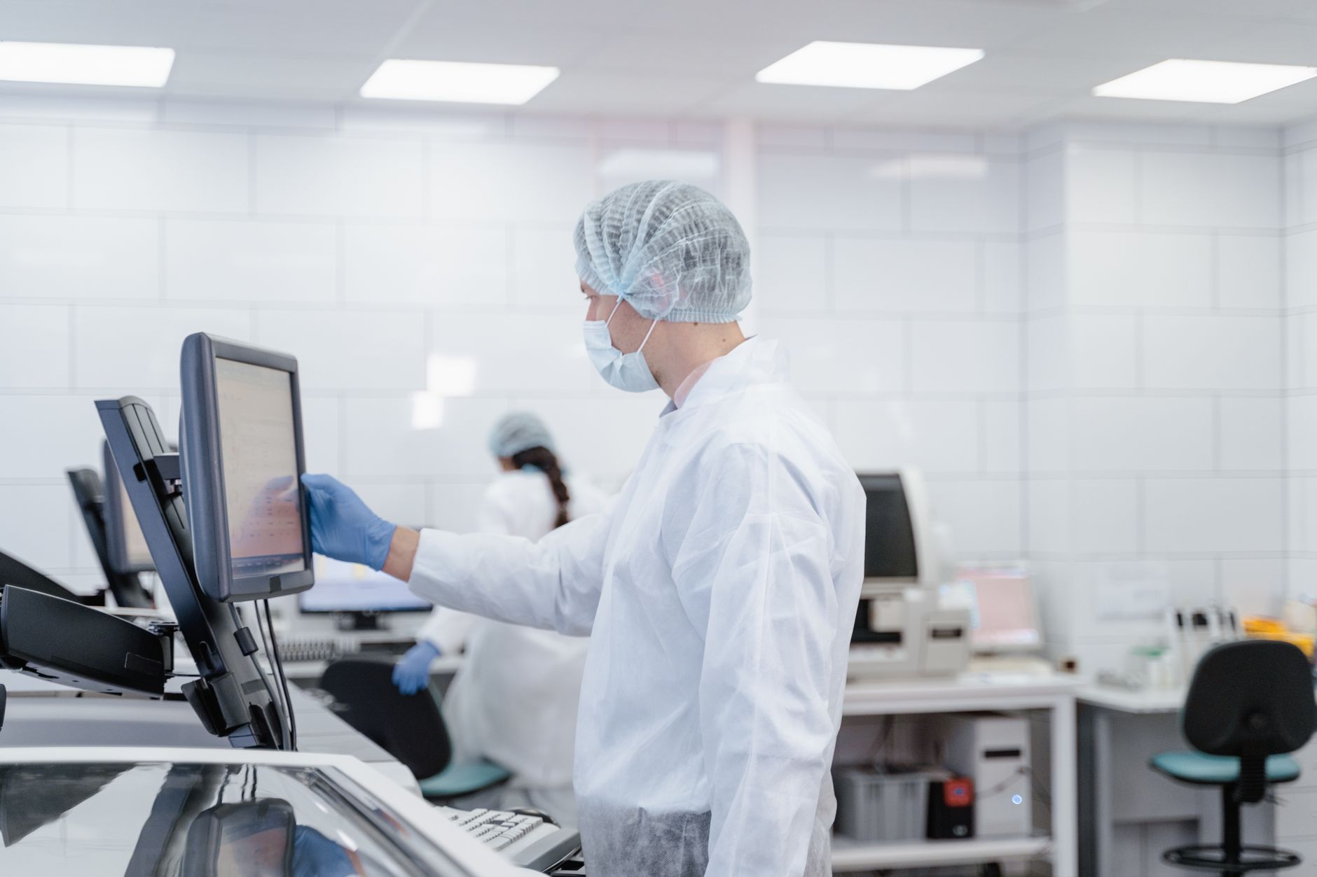 A scientist working in a lab, representing clinical trial research.