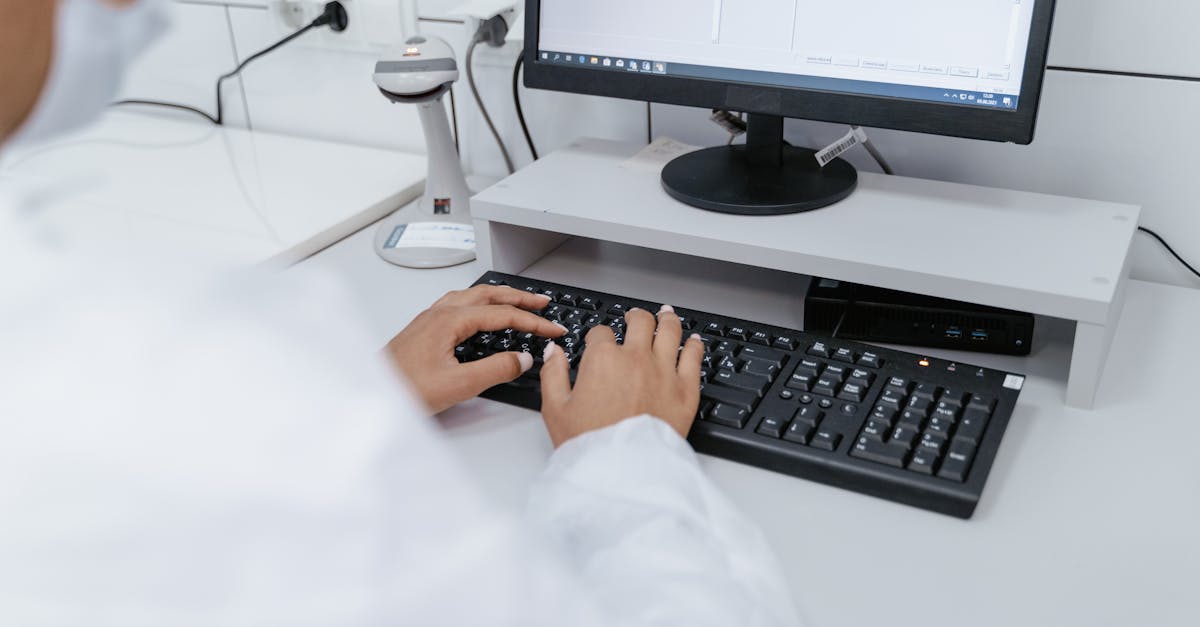 Medical Professional using Computer · Free Stock Photo