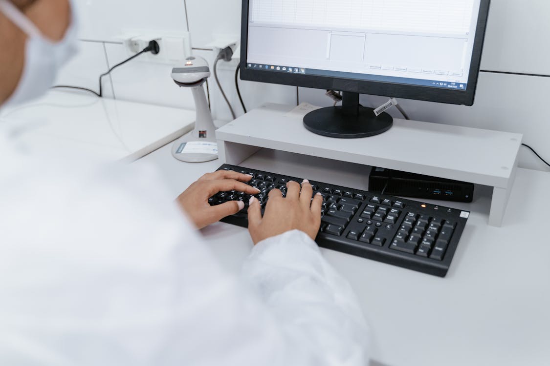 Medical Professional using Computer 