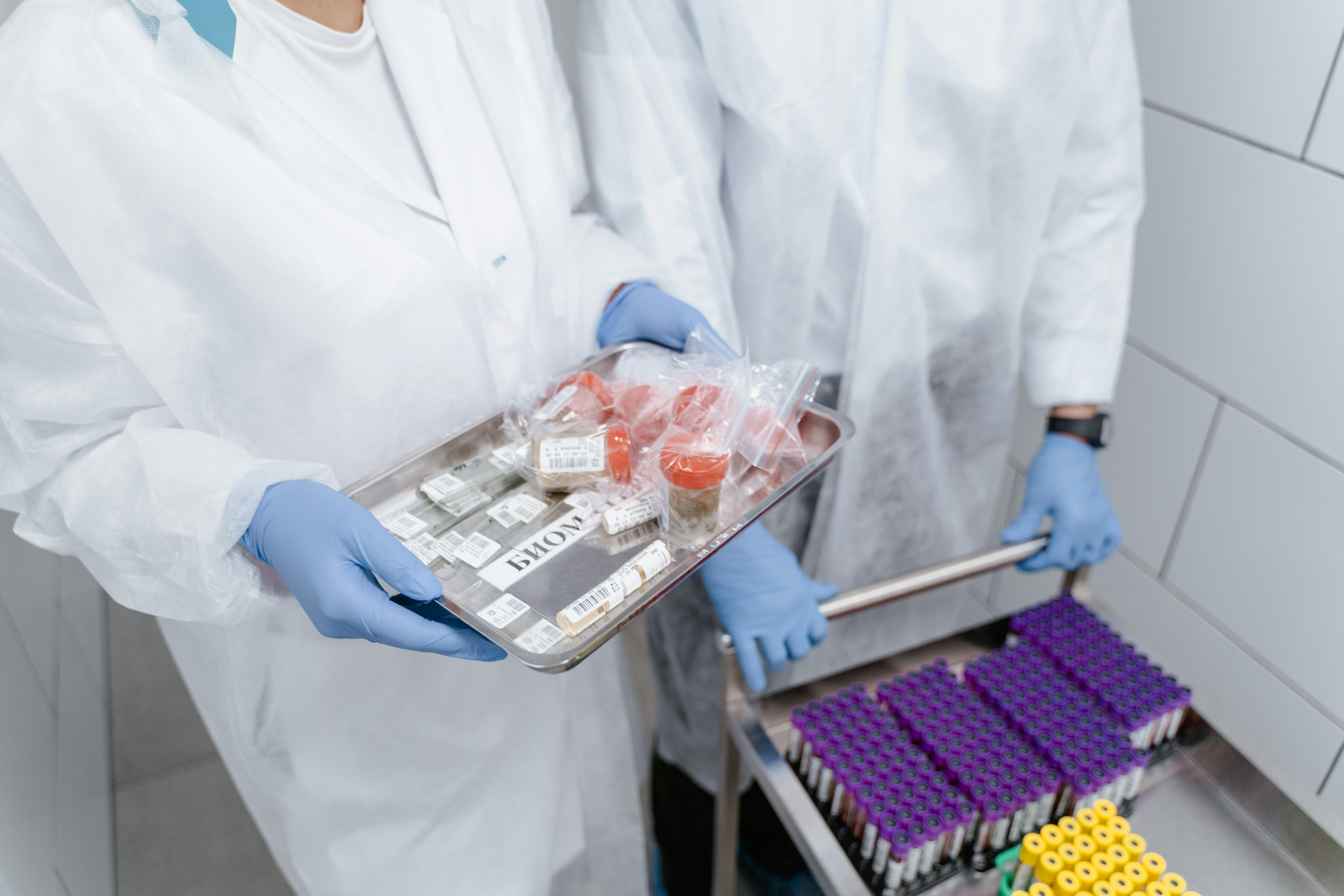 medical professional holding a tray of samples