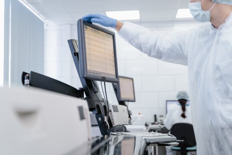 Scientist Looking At A Screen