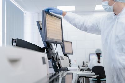 Senior researcher analyzing screen data