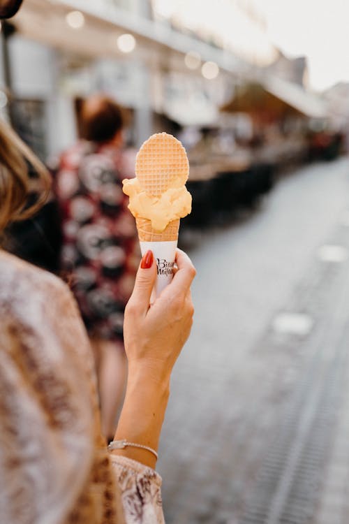 Woman Holding Ice Cream Cone