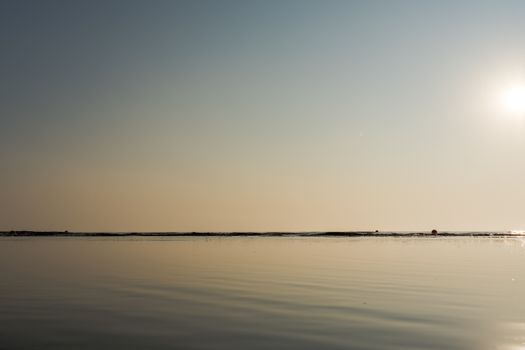 Peaceful sunrise over the tranquil waters at Binz, capturing the serene beauty of nature.