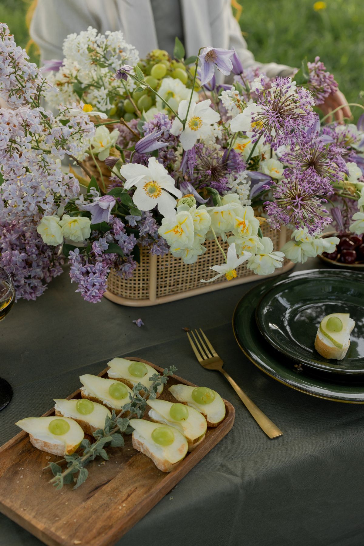 White and purple flowers arranged on a table