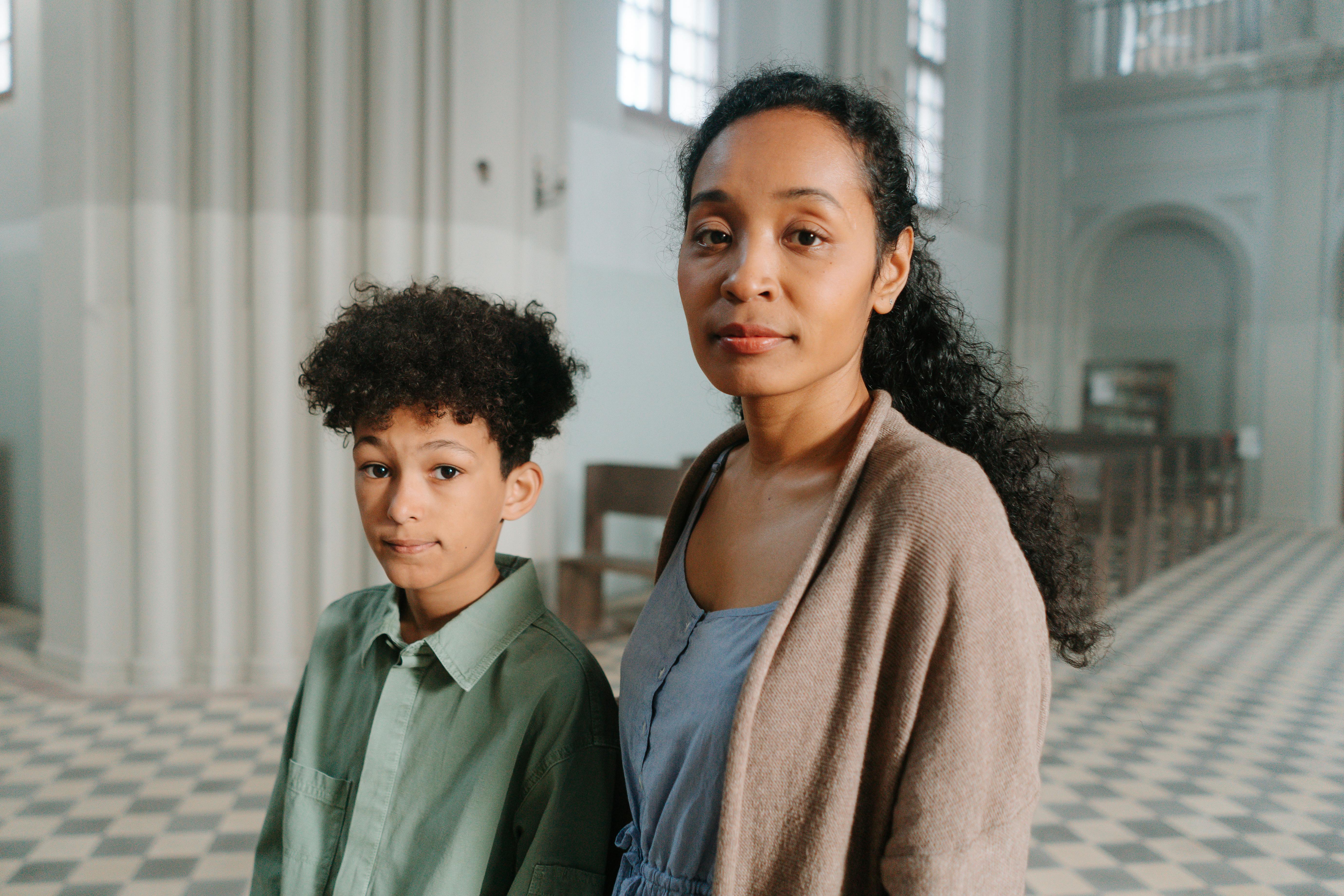 mother and son looking at the camera