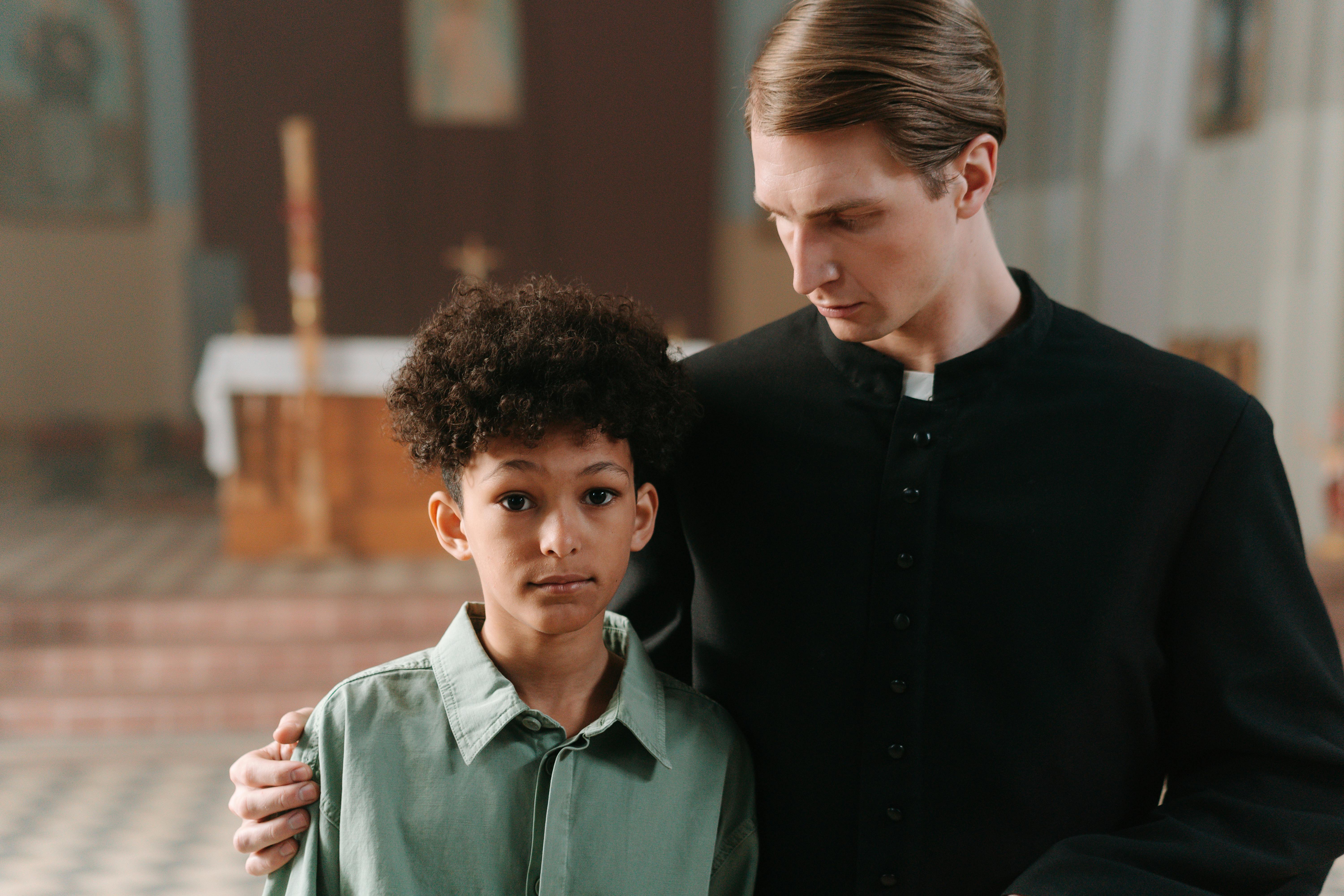 a boy in black long sleeve shirt