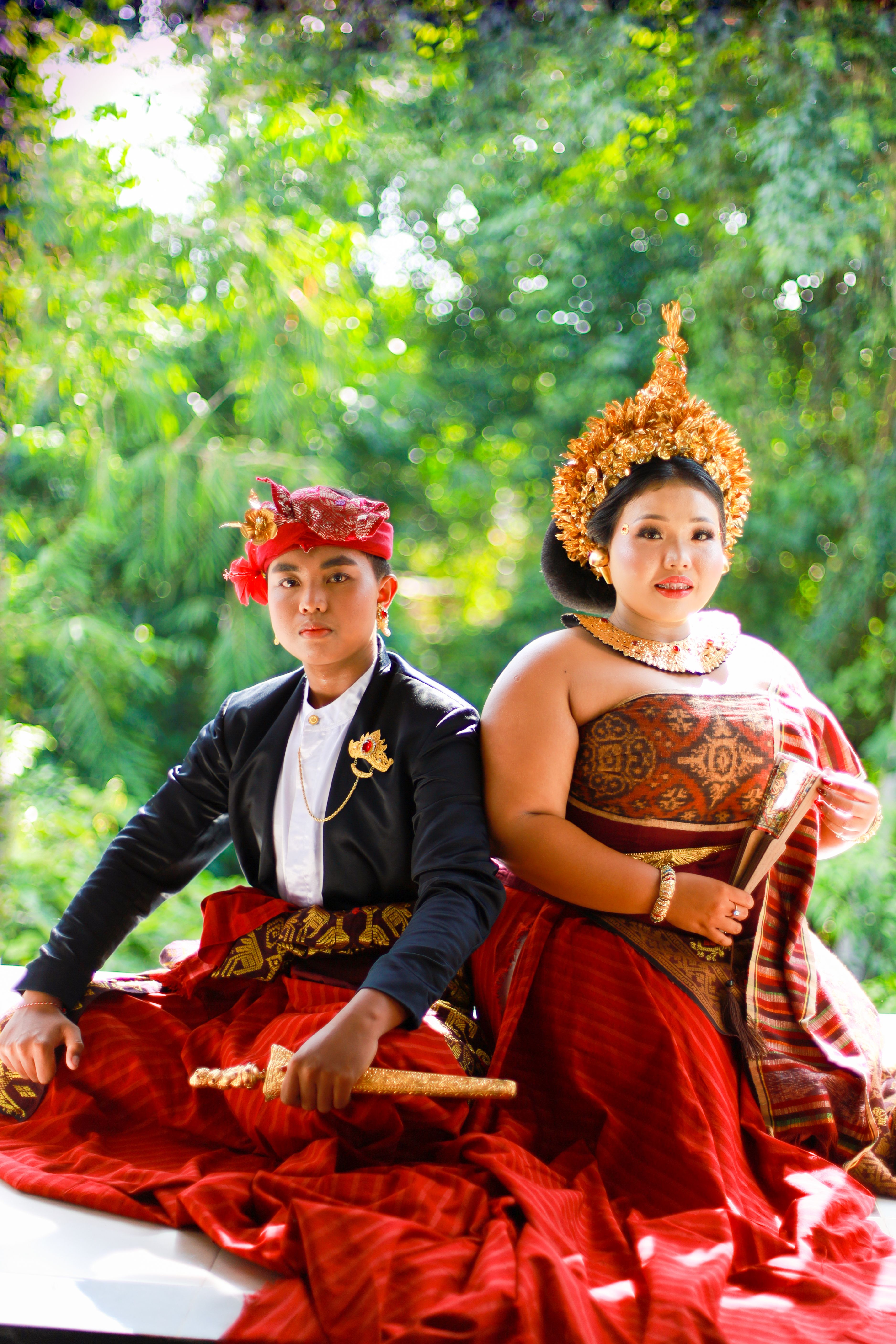 Young Asian Couple in Traditional Costumes Hugging · Free Stock Photo