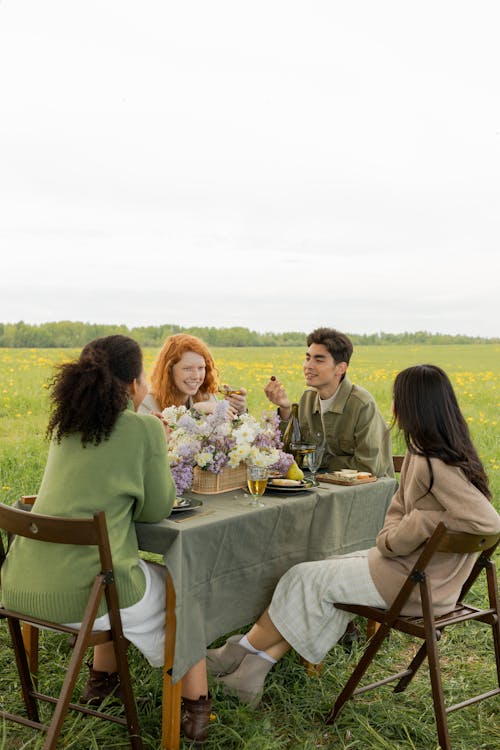 Friends Sitting at the Table