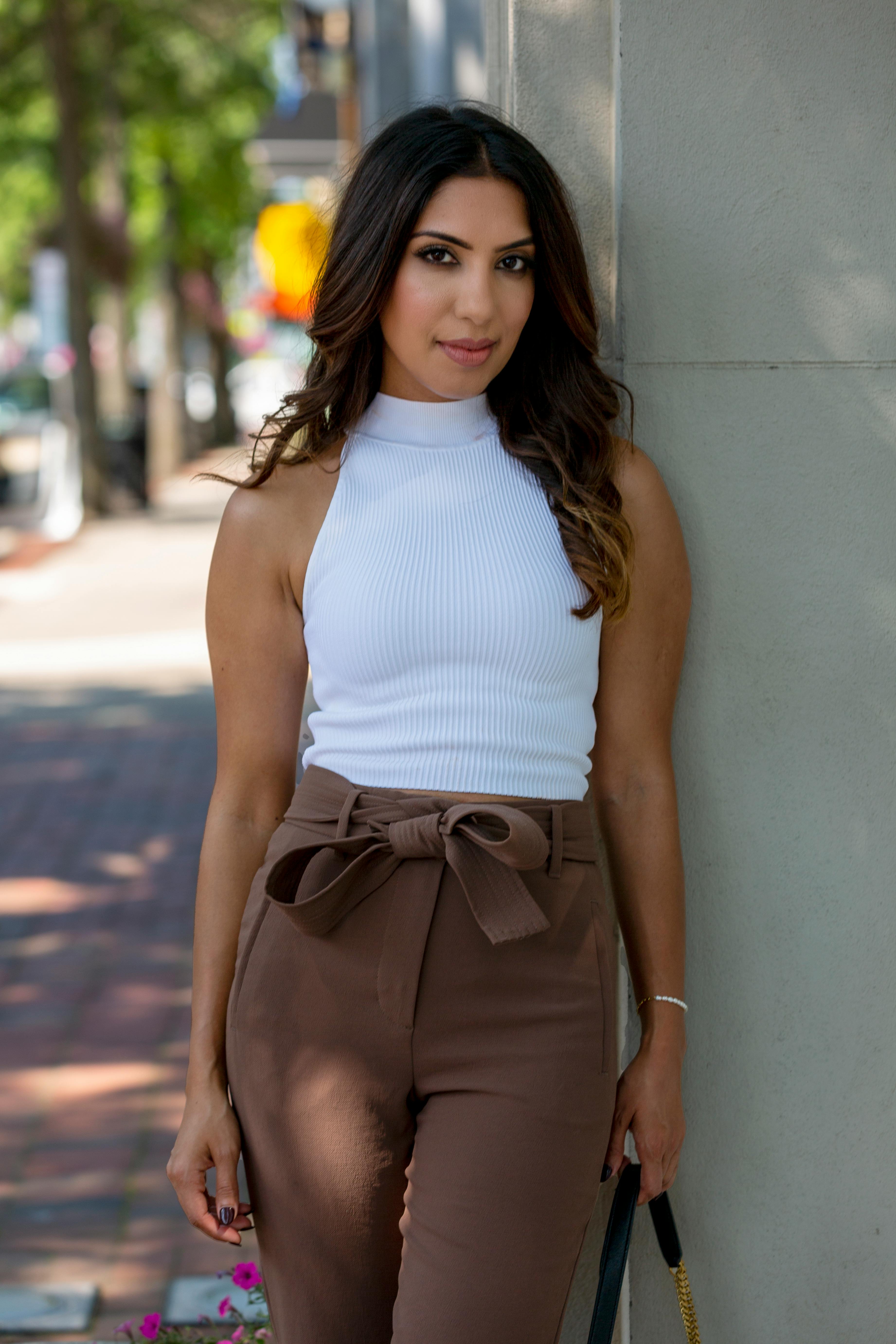 Model Posing In Pants On Bed Free Stock Photo model-posing-in-pants-on-bed-free-stock-photo