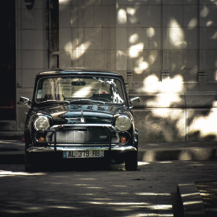 A Black Morris Mini Saloon De Luxe Car