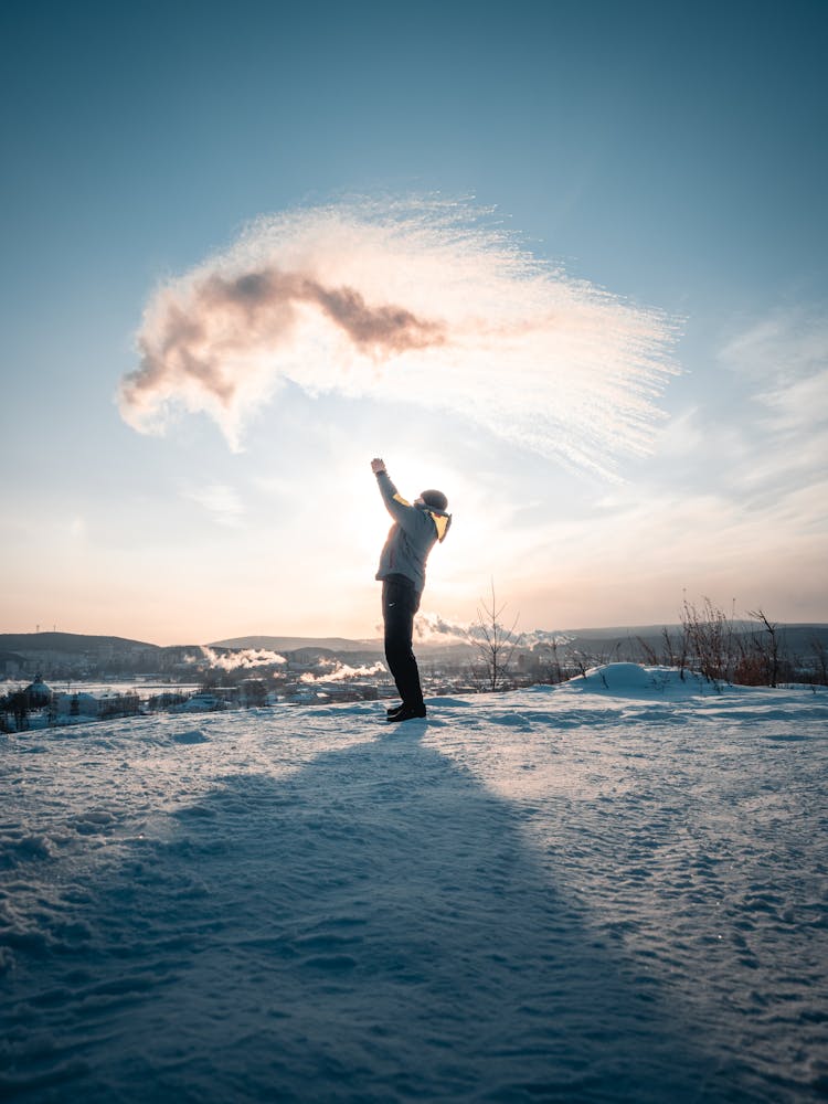 A Man With A Dust Cloud Over Him