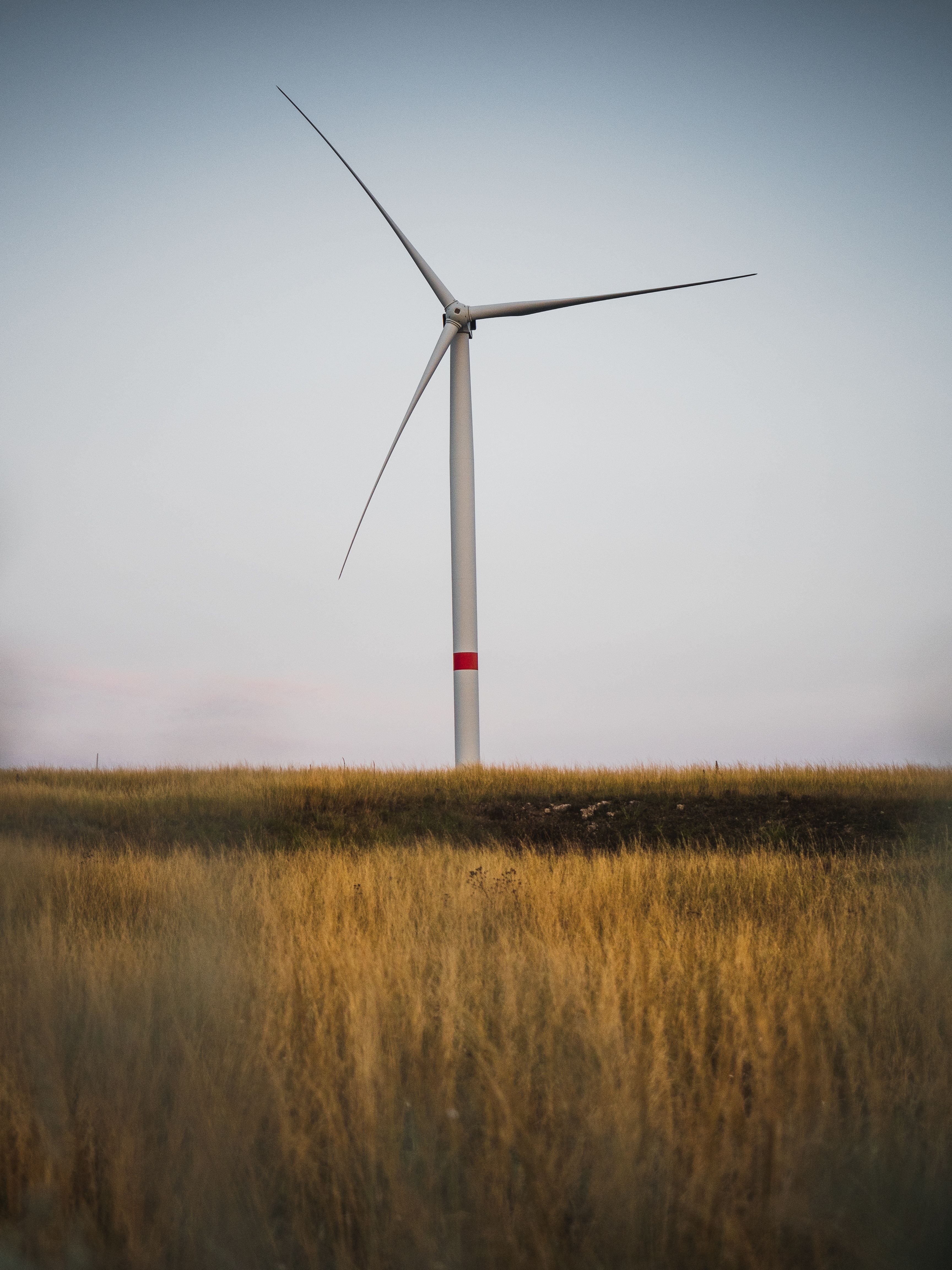 White Wind Turbine on Brown Grass Field · Free Stock Photo