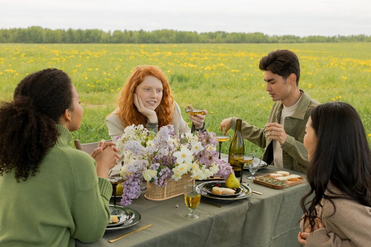 Group Of Friends Having An Outdoor Lunch