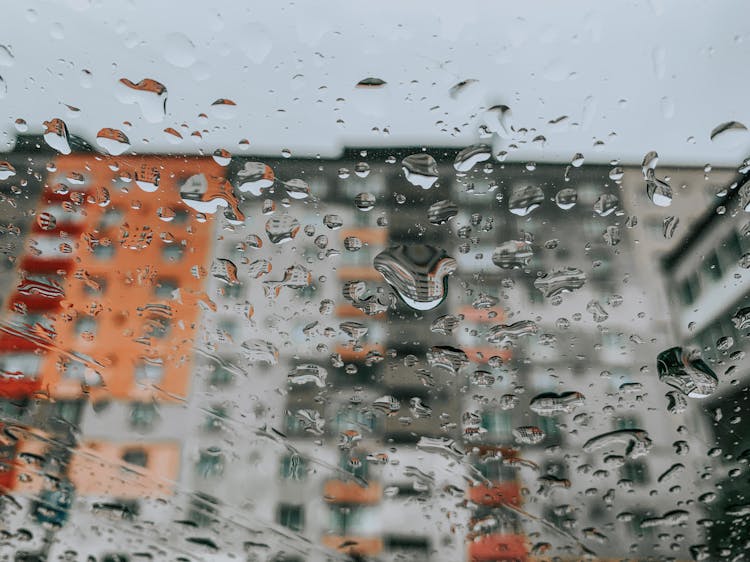 Photo Of Raindrops On A Windshield 