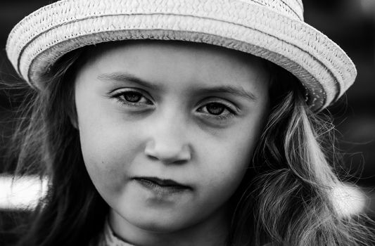Grayscale Photo of Girl Smirking