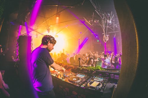 Free A DJ Playing inside a Nightclub Stock Photo