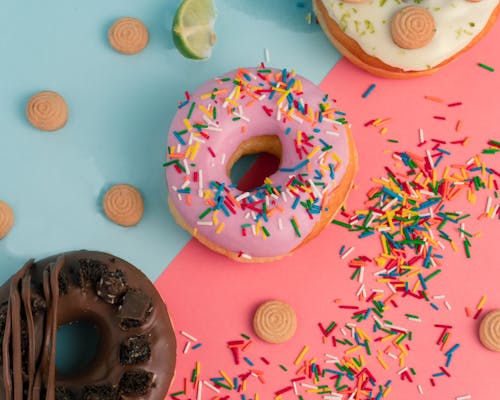 Free Sprinkles on a Pink Donut Stock Photo