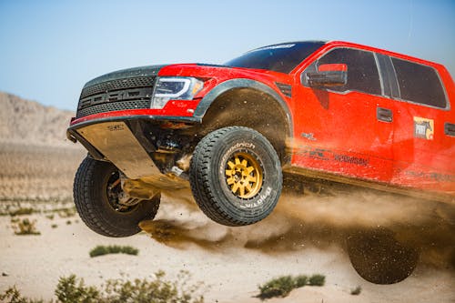 Dusty Ford F-150 Raptor Driving Off-road