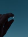 A Person Holding the Moon