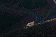 Aerial View of Road in the Middle of Green Trees