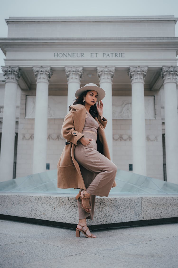 A Fashionable Woman Posing In The Legion Of Honor