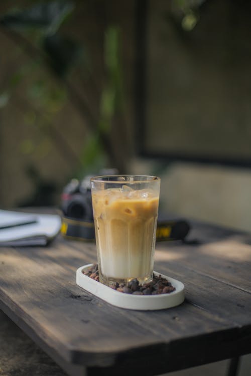 Free A Glass of Refreshing Milk Tea on a Wooden Table Stock Photo