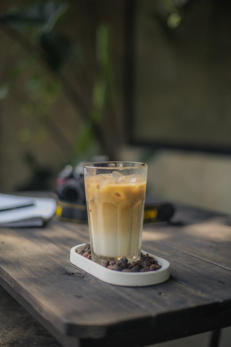 A Glass Of Refreshing Milk Tea On A Wooden Table