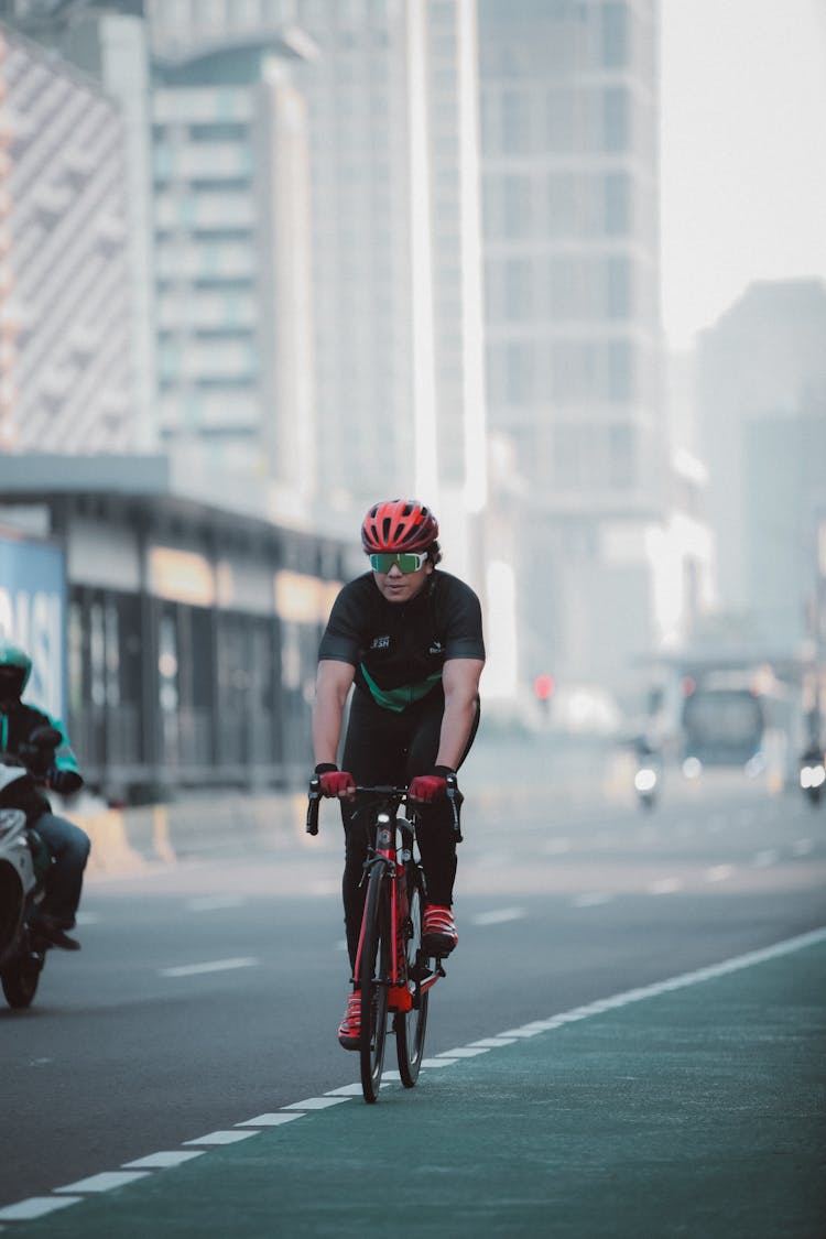 Man On A Bicycle On A City Street 