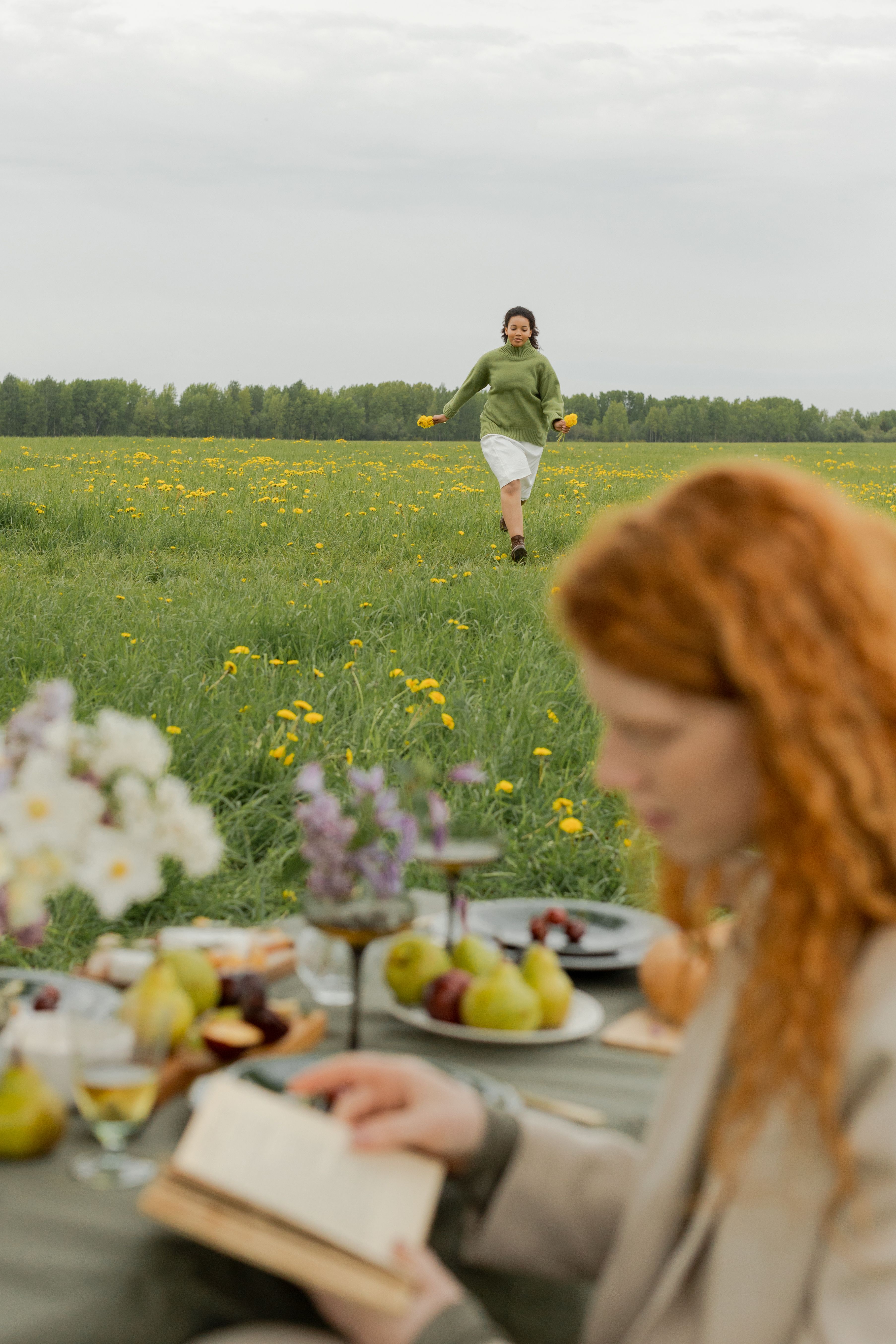 Women Holding Hands while in a Flower Field · Free Stock Photo