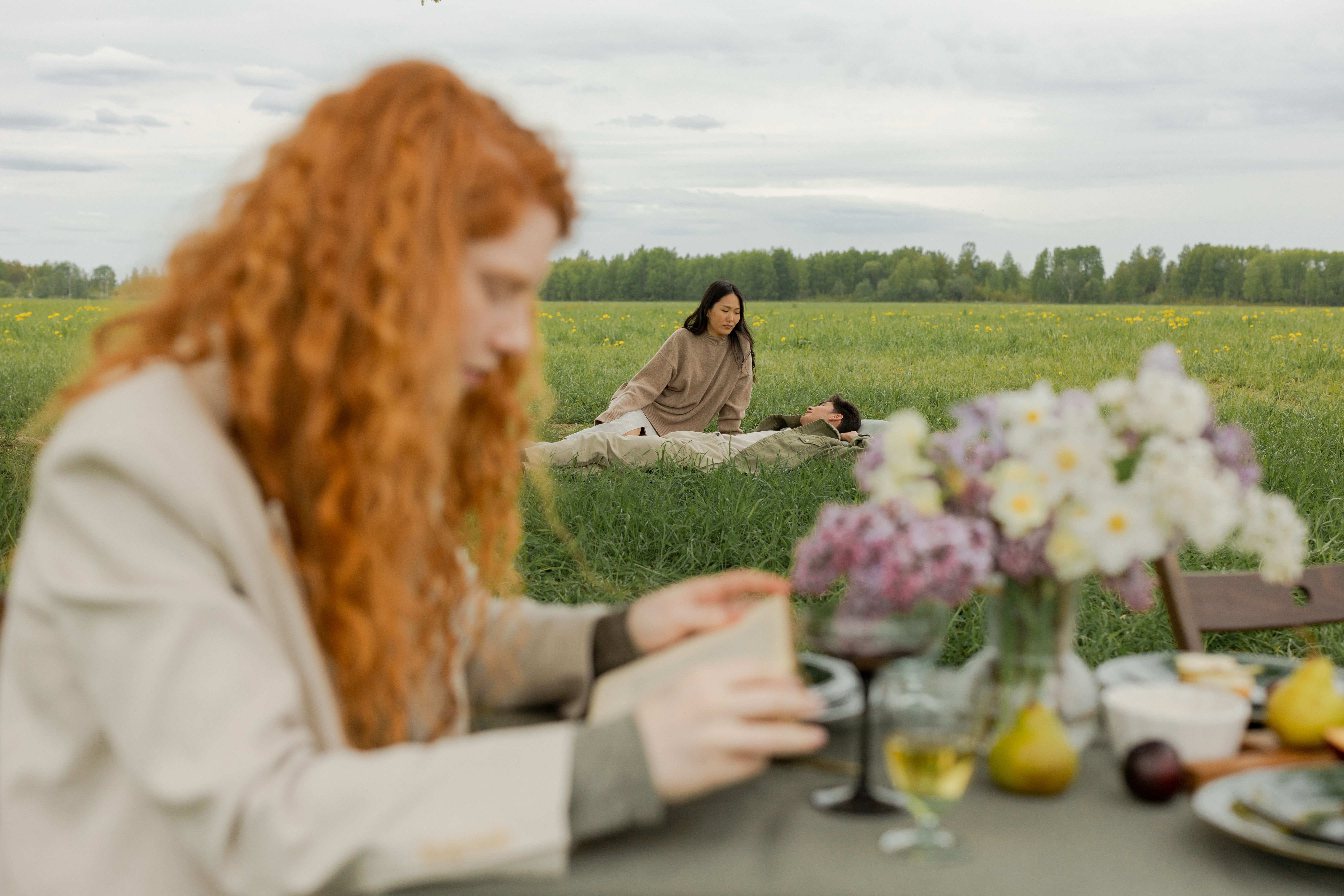 Women Holding Hands while in a Flower Field · Free Stock Photo