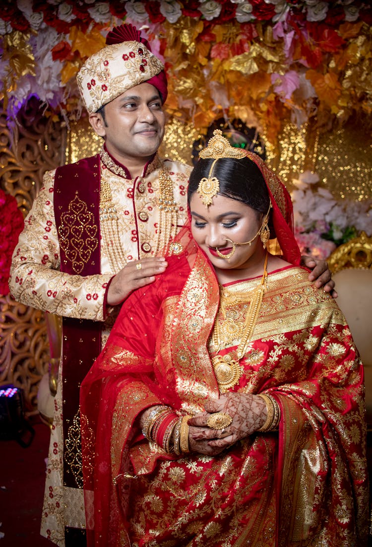 A Romantic Couple In Traditional Dresses