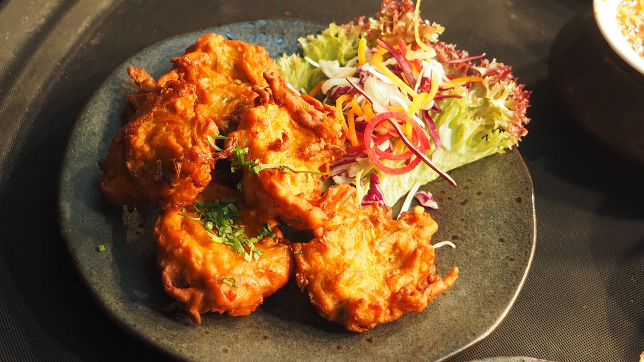 Food Dish Served on Black Ceramic Plate