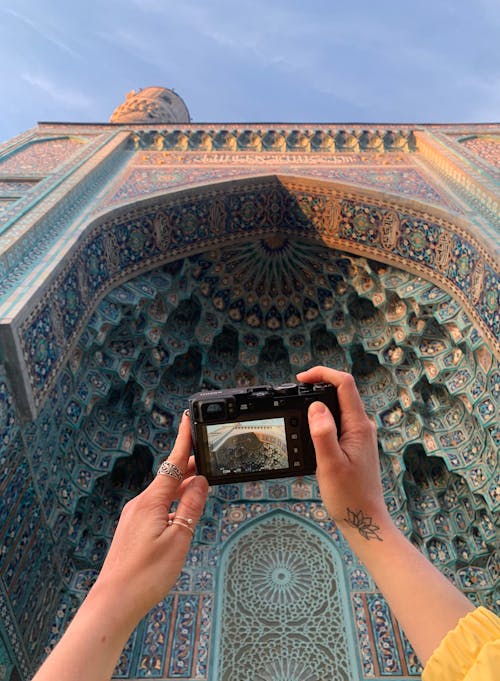 Person taking a Photo of an Architectural Landmark 
