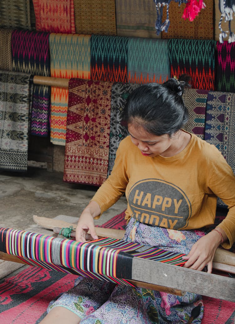 
A Woman Weaving Cloth