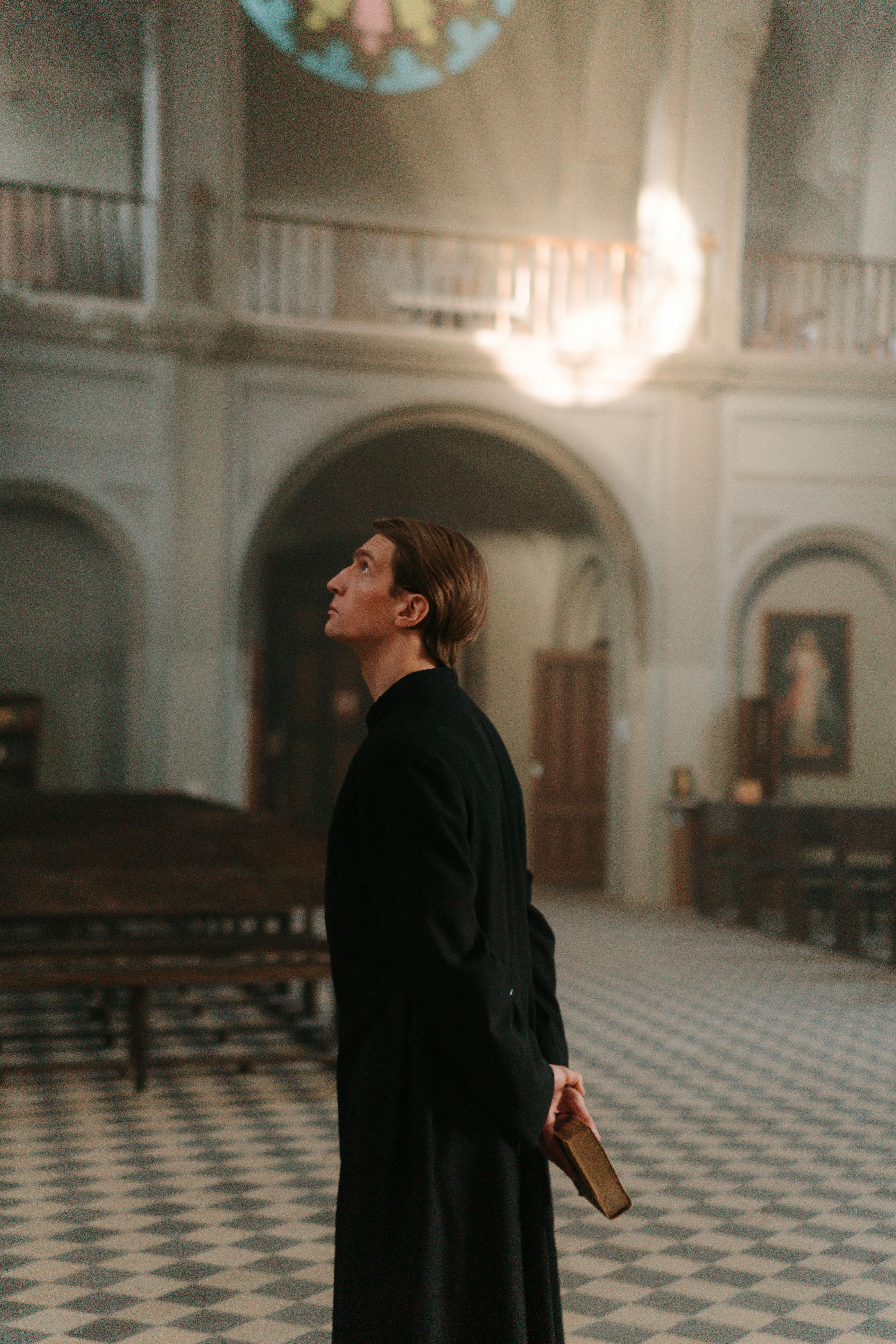priest in black cassock
