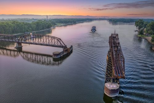 Free Captivating aerial view of the historic swing bridge in La Crescent, Minnesota during sunset. Stock Photo