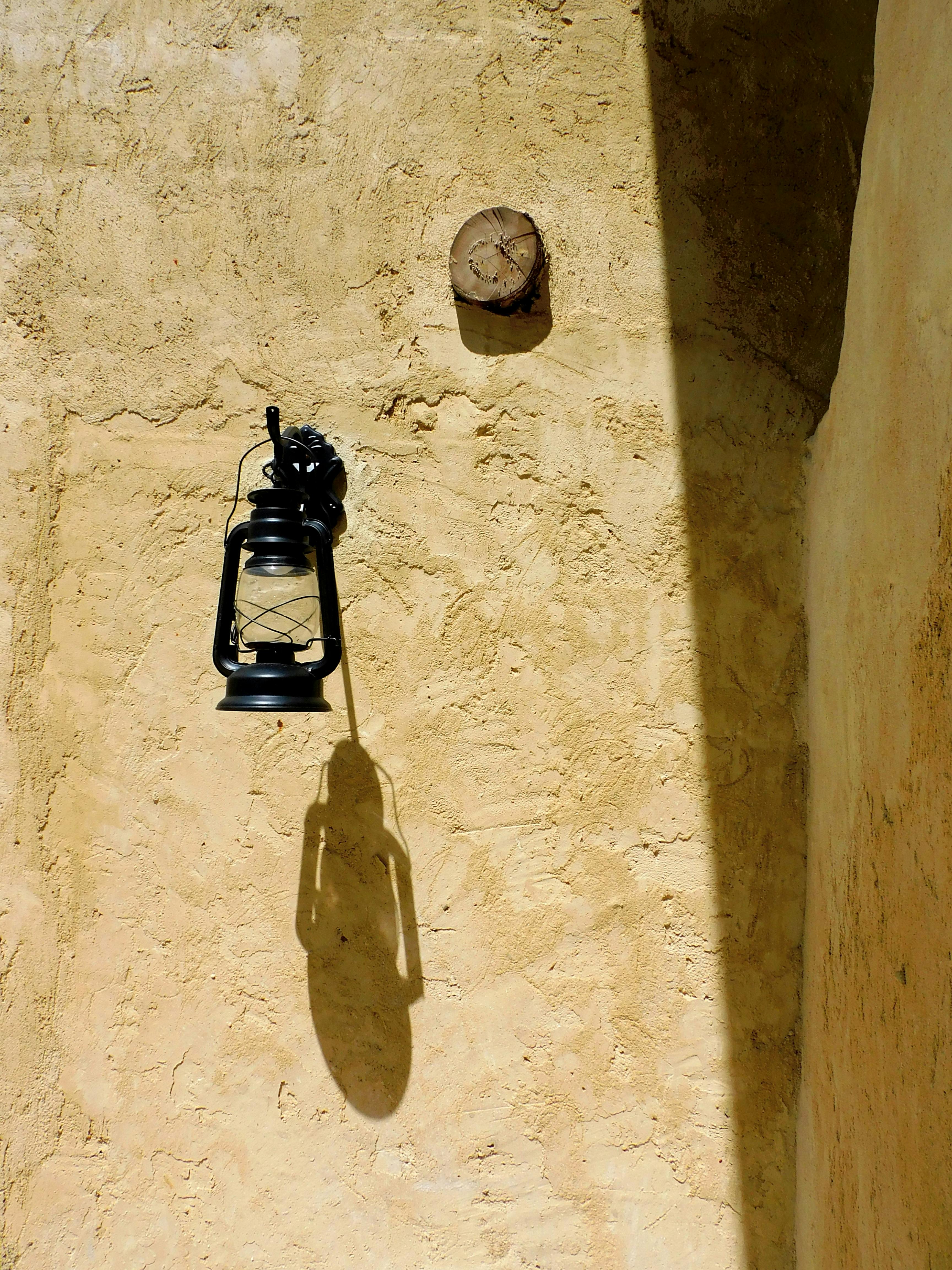 A Kerosene Lamp Hanging on the Wall · Free Stock Photo