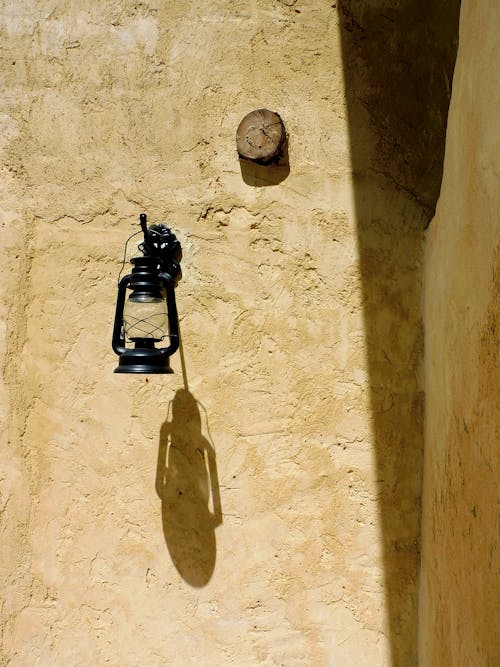 A Kerosene Lamp Hanging on the Wall