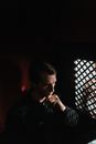A Priest Inside the Confession Room