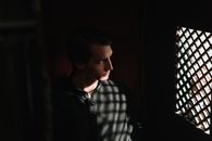 A High Angle Shot of a Priest Inside the Confession Room