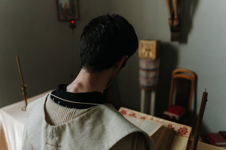 A Man Reading Bible