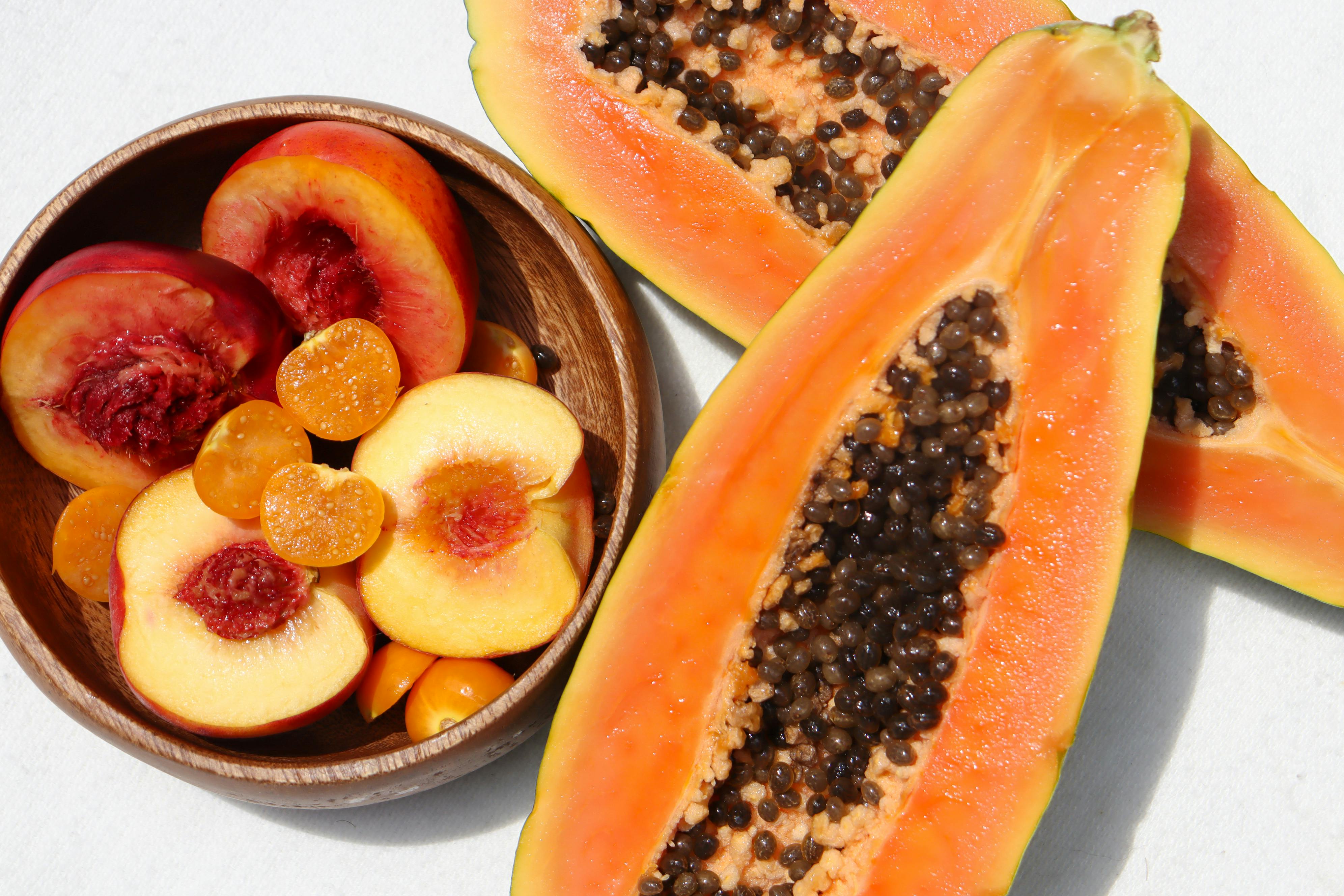 Close Up Photo Of Sliced Nectarine And Papaya Free Stock Photo