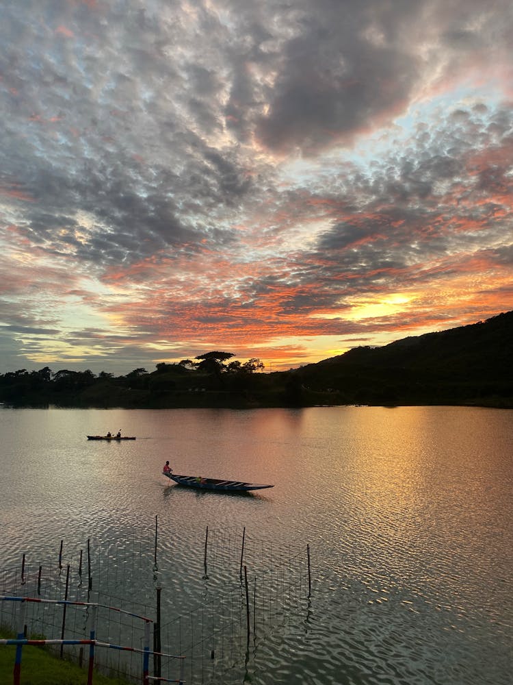 A Boat On The Sea During Sunset