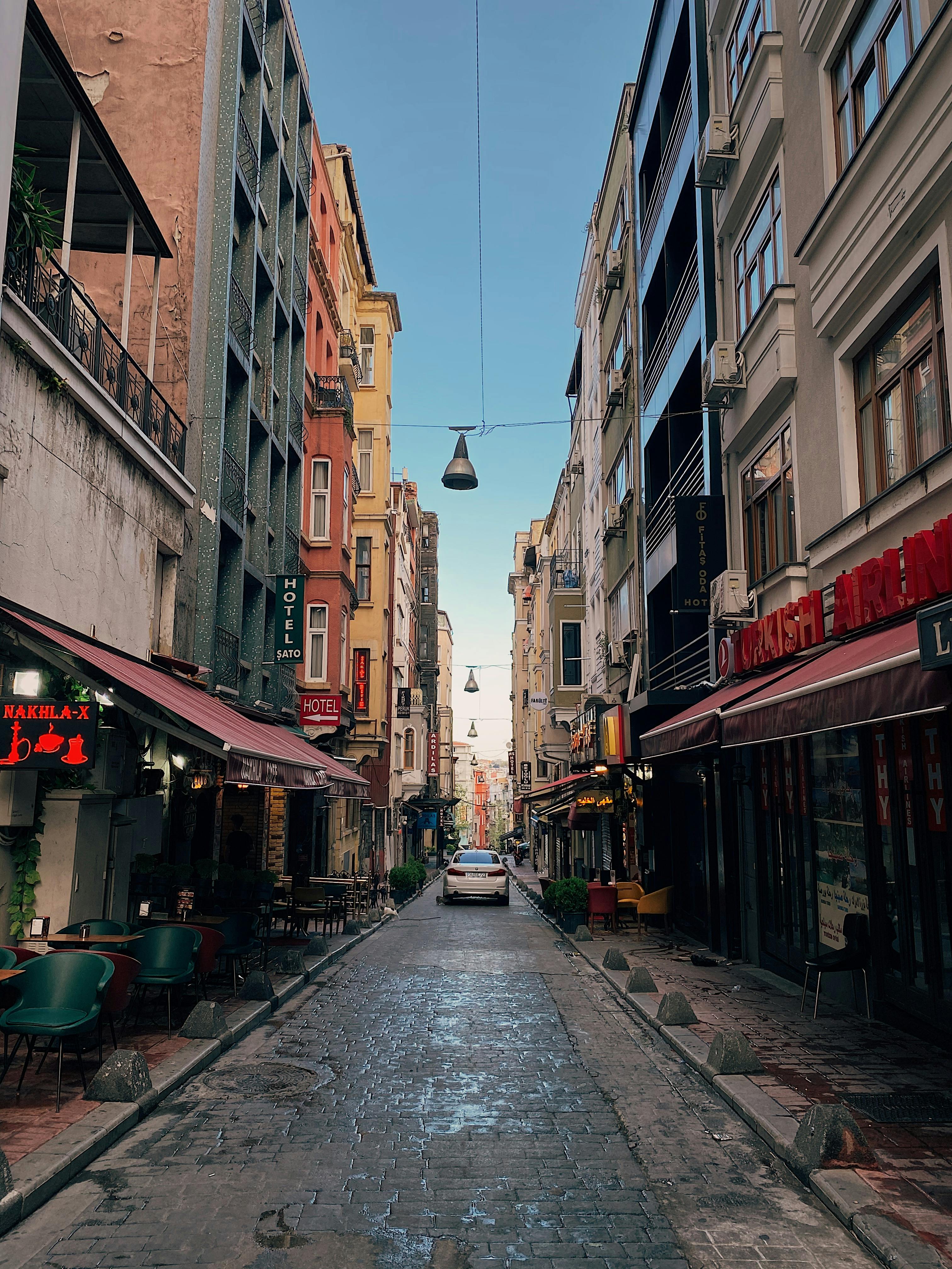 Street in between Brick Buildings · Free Stock Photo