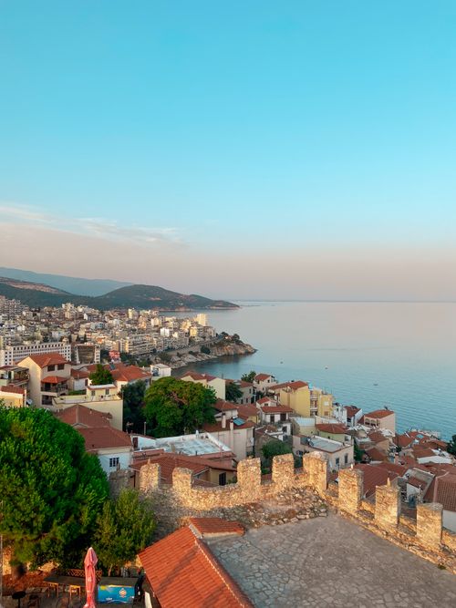 Free A breathtaking aerial view over Kavala, Greece, showcasing charming architecture against the serene Aegean Sea backdrop. Stock Photo