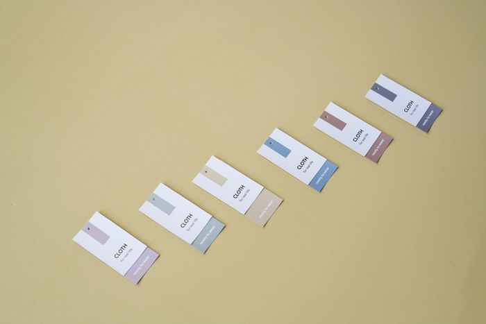 Printed swing tags laid out in a row — photo by Ron Lach on Pexels
