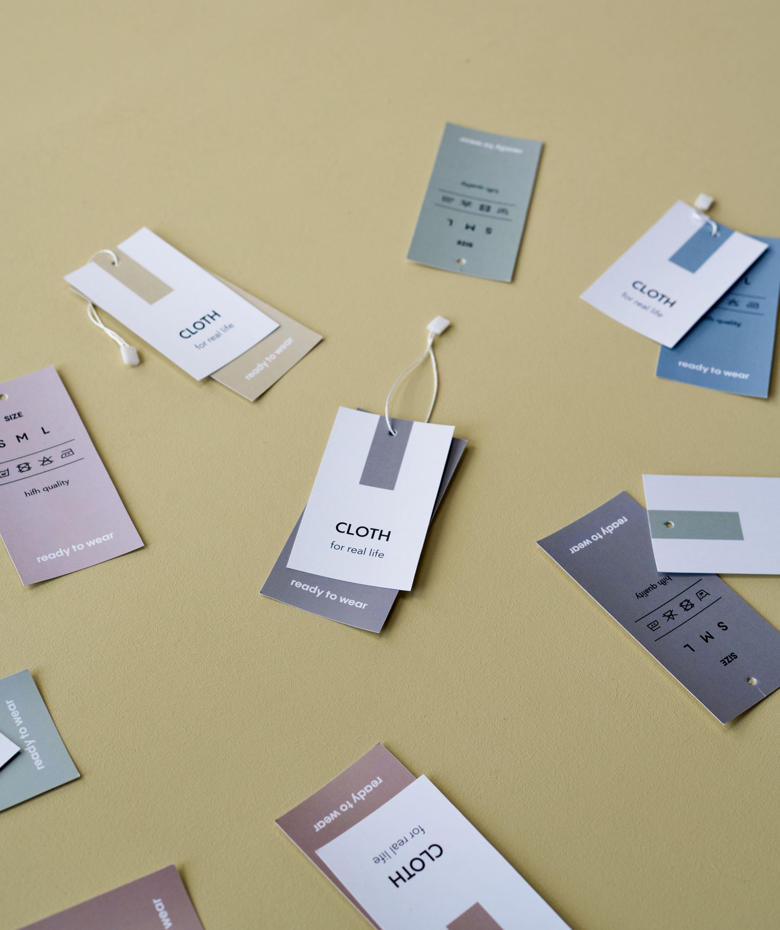 Minimal fashion tags and clothing arrangement without people