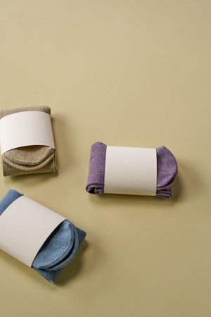 Rolled pairs of ribbed socks — photo by Ron Lach on Pexels