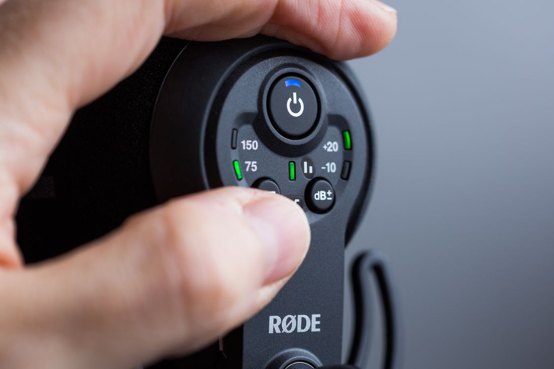 persons holding a red and black remote controllers ·... Person Holding Black Remote Control · Free Stock Photo